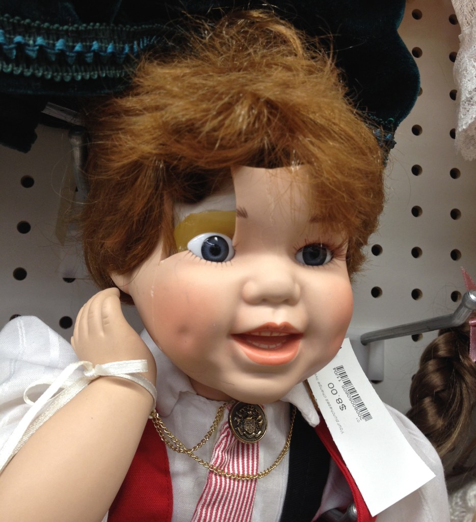 Broken face doll