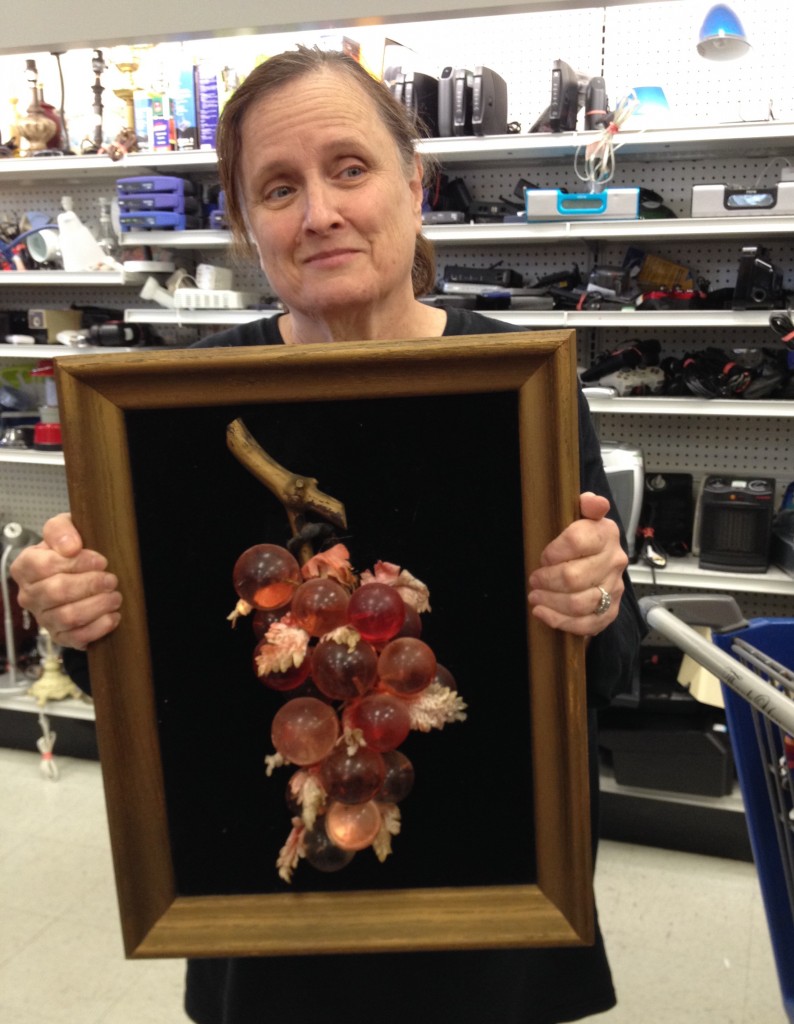 Framed glass grapes on velvet